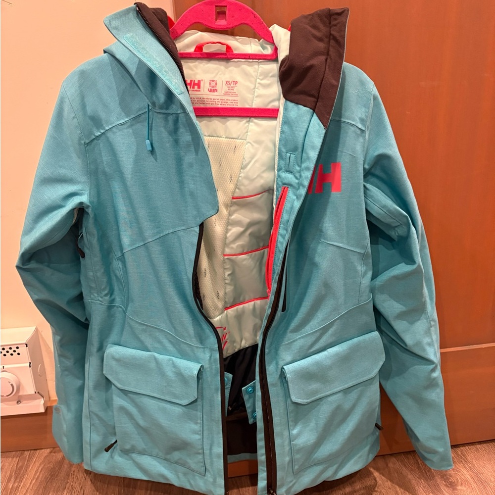 Helly Hansen Turquoise ULLR Women's XS ski Jacket worn twice.
